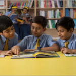 How does helping classmates create friendly and supportive schools in Vasai?